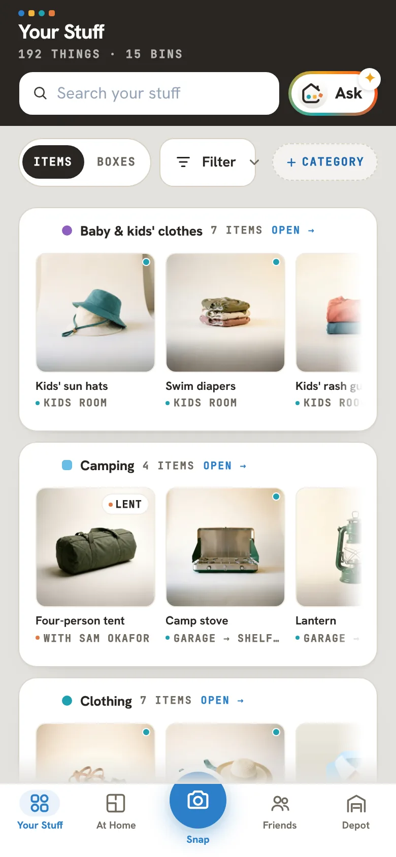 Your Stuff in Caboodle: her things in bins by category, Baby & kids’ clothes first, each with its photo and its room